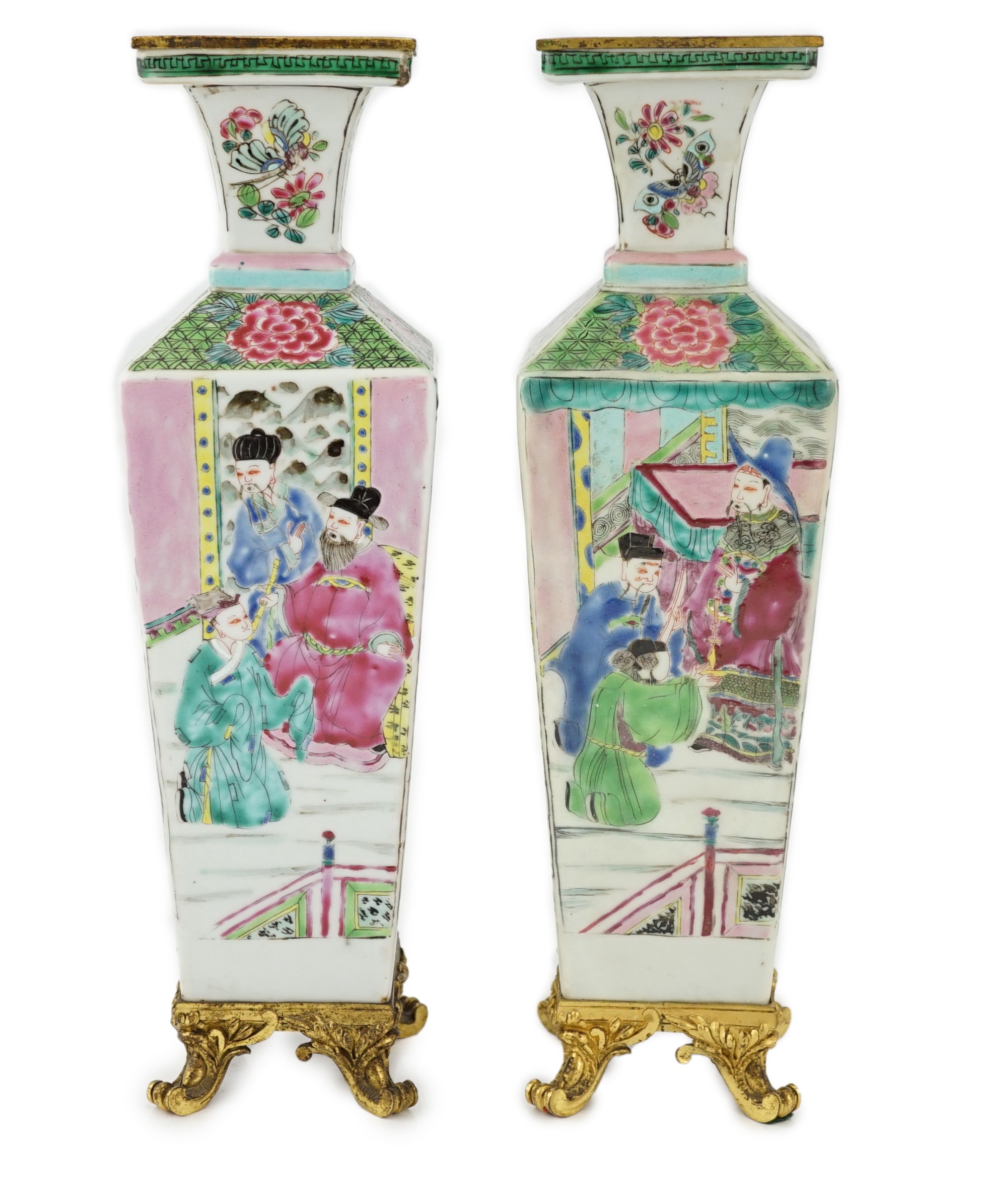 A pair of Chinese famille rose square baluster vases, late 19th/early 20th century, with European gilt metal mounts, each painted with figure scenes, total height 32cm